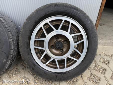 Koła letnie 4x100 R14 AVUS 6J ET38 57,  1 mm stan DB + 185/60 Dębica 3,  5/4,  5 mm