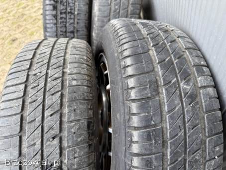 Koła letnie 4x100 R14 AVUS 6J ET38 57,  1 mm stan DB + 185/60 Dębica 3,  5/4,  5 mm