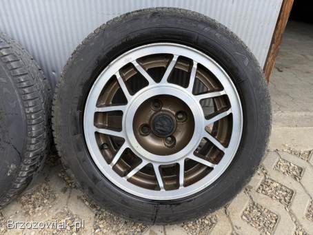 Koła letnie 4x100 R14 AVUS 6J ET38 57,  1 mm stan DB + 185/60 Dębica 3,  5/4,  5 mm