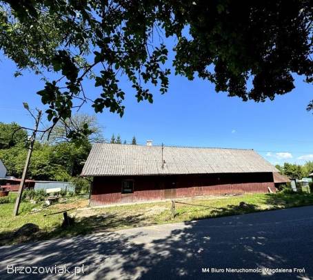 Działka z drewnianym domem w Chorkówce.