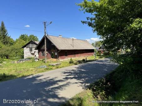 Działka z drewnianym domem w Chorkówce.