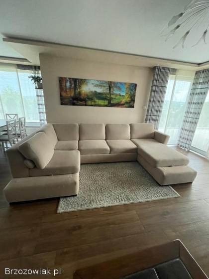 Sofa narożna U z funkcją spania i pojemnikiem 340x190 cm beżowa