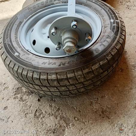 Oś z kołami do przyczepki